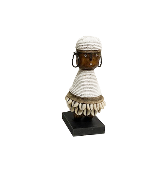 Boy Naamji Doll with beaded cowrie shell details on a custom stand, 19cm tall.