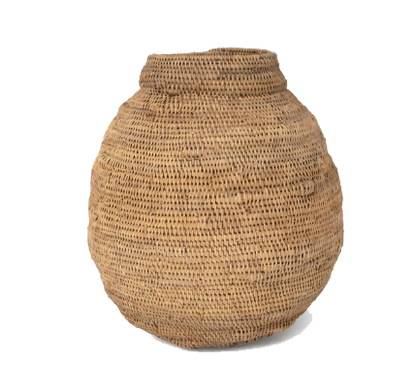 Natural woven Buhera basket from Zimbabwe, handcrafted from Ilala palm leaves.