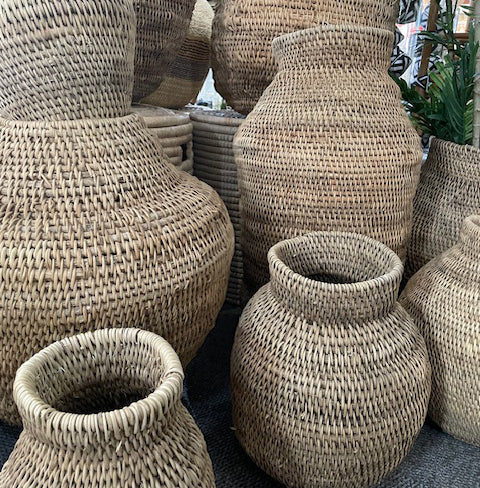 Handcrafted Buhera baskets made from Ilala palm leaves, traditional African design, Zimbabwe.