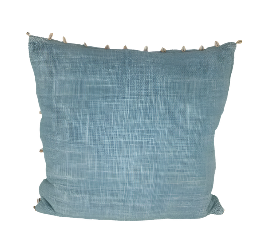 Light blue cushion with cowrie shell design, 50cm x 50cm.