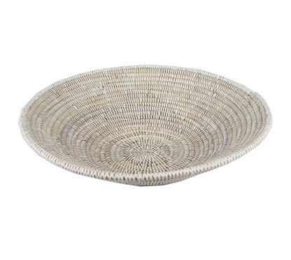 African decor basket made of natural fibers with intricate patterns