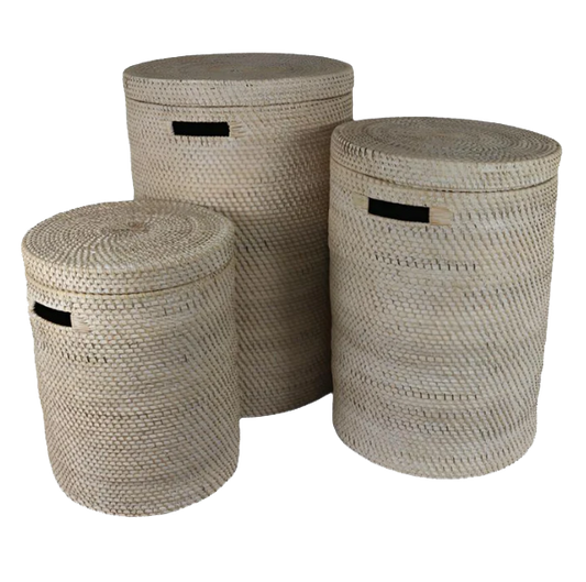 Set of three natural white wash rattan laundry baskets in small, medium, and large sizes.