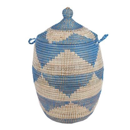 Small woven laundry basket with Blue African pattern, handcrafted from sustainable seagrass and recycled plastic.