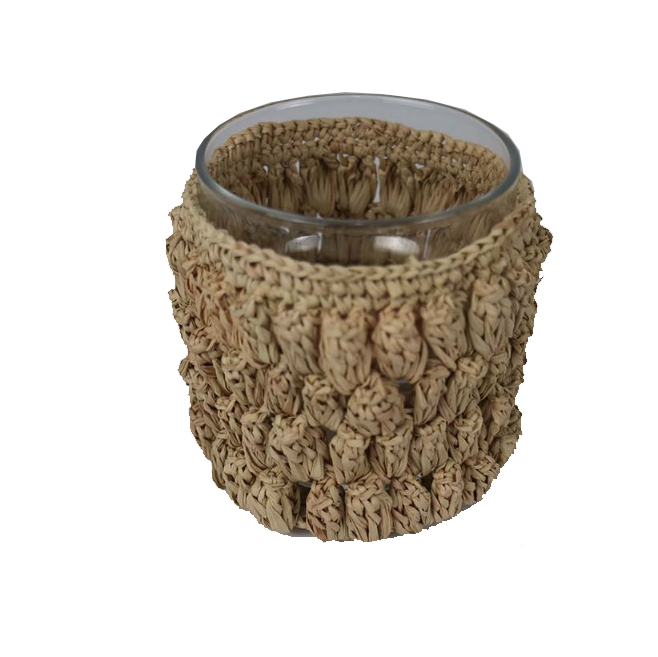 Crochet candleholder with natural texture and glass insert.