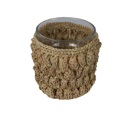 Crochet candleholder with natural texture and glass insert.