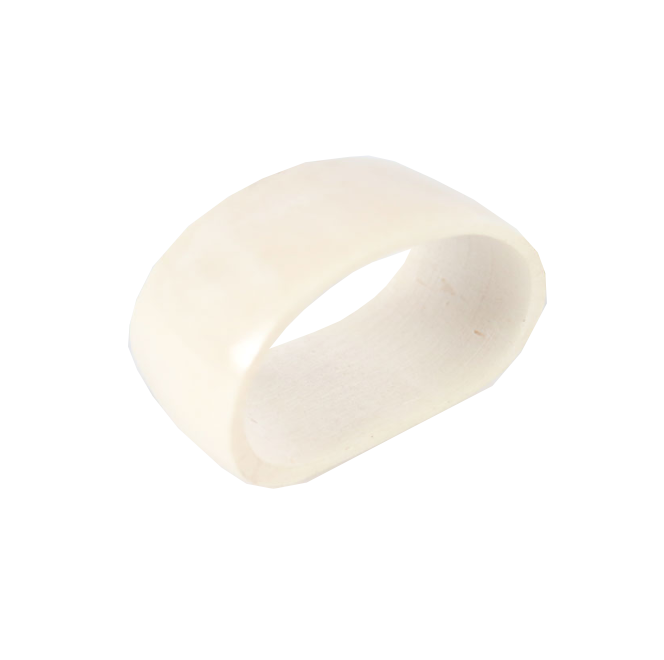 Bone napkin ring with ivory-like finish, handcrafted decor piece.