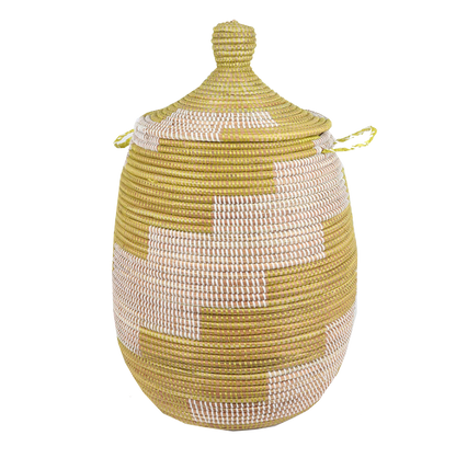 Small woven laundry basket yellow handcrafted from seagrass and recycled plastic with vibrant African patterns.